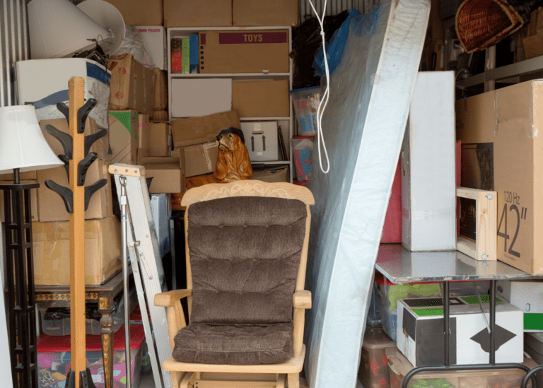 A storage unit filled with furniture and boxes.