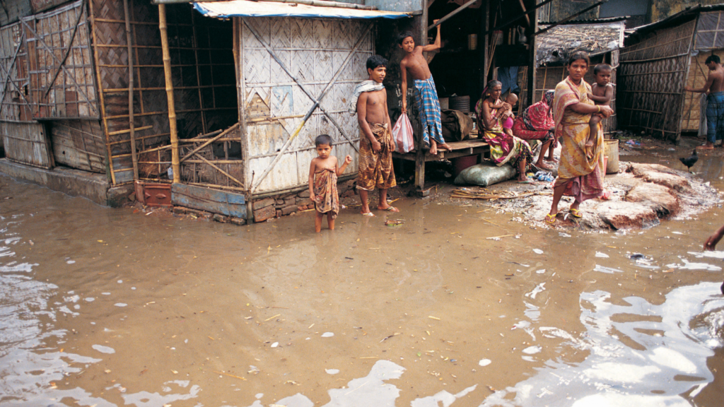 Flooding surrounding homes and families in Bangladesh.