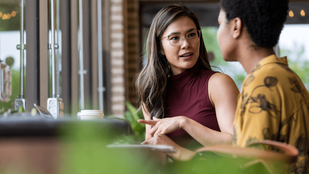 Woman talking about her concerns with a friend.