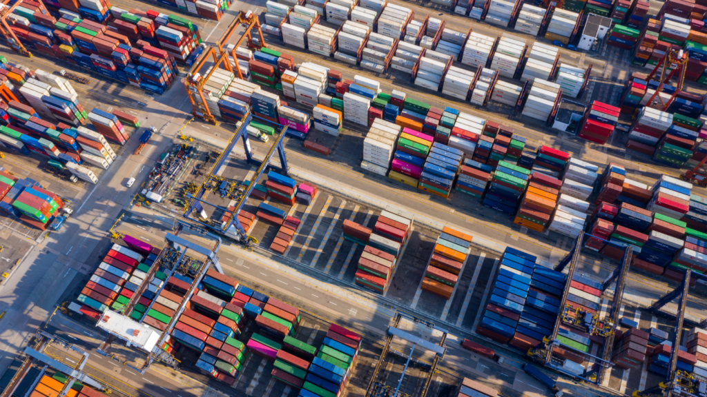 View from above a busy shipping terminal where modern supply chains are incredibly complex and can span over one hundred countries. 