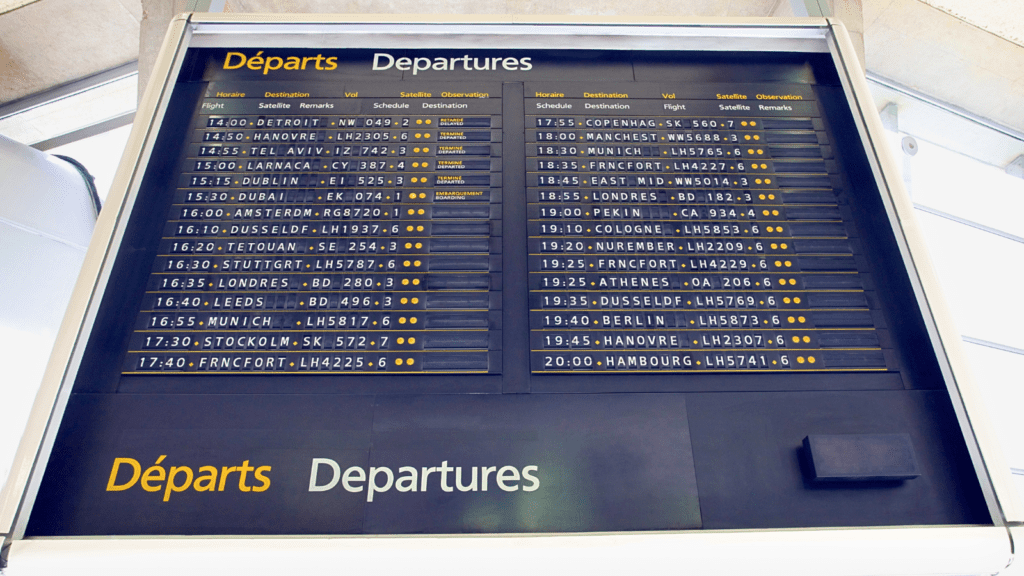 Departures board at Paris airport shows the number of flights for the Olympic Games