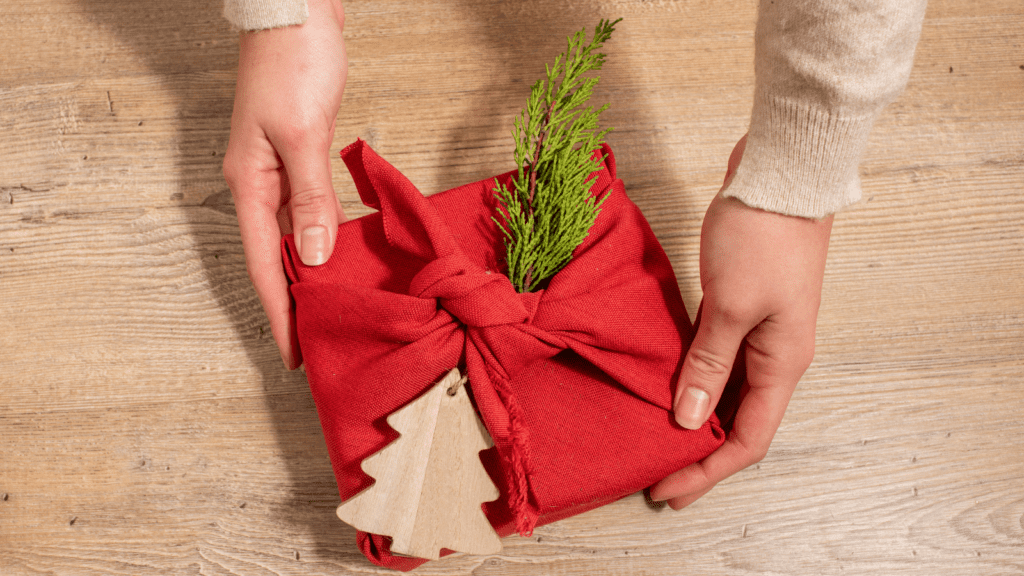 Gift box wrapped in fabric furoshiki style